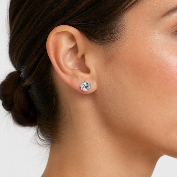 0.28 Inch Rhodium-Plated Sterling Silver Woven Love Knot Stud Earrings