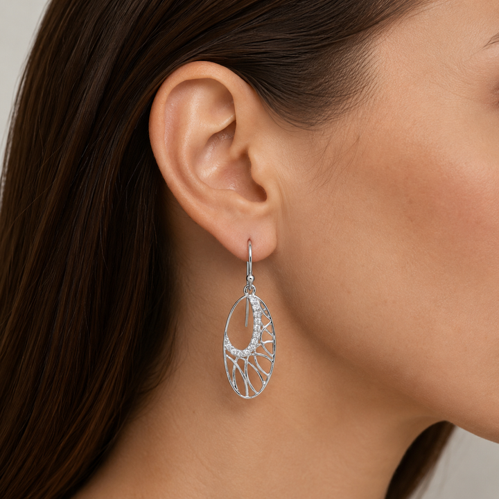 1.5 Inch Openwork Oval Diamond Simulant Dangle Earrings in Rhodium-Plated Sterling Silver
