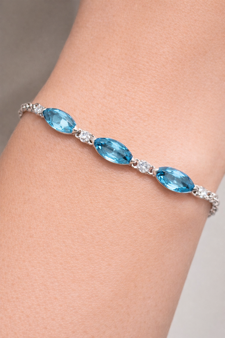 Sterling Silver Sky Blue Topaz Bracelet – 7.25” Bracelet with Four 8x14mm Marquise Sky Blue Topaz Stones