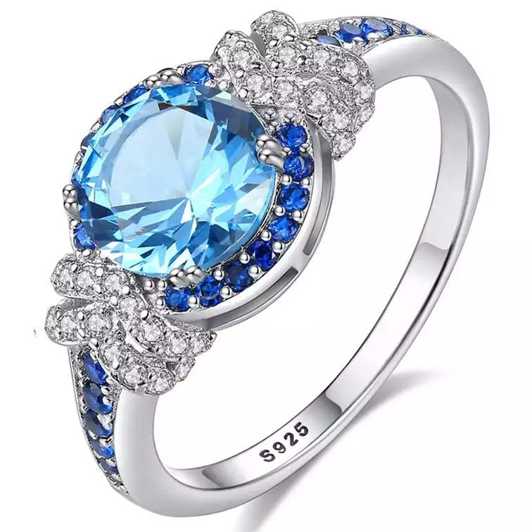 Topaz Simulant Halo Silver Ring